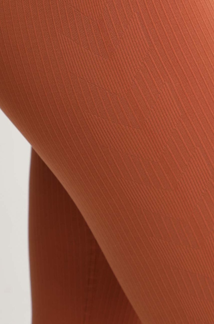 Tréninkové legíny Hummel hmlMT ADAPT SEAMLESS MW TIGHTS hnědá 223863