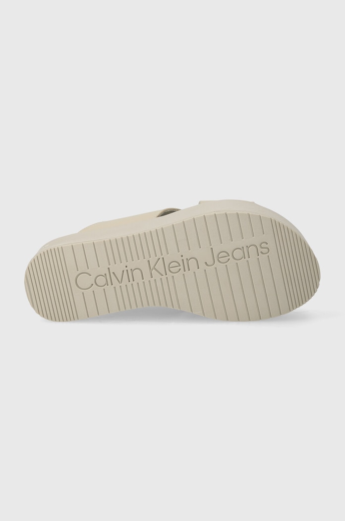 Calvin Klein Jeans klapki skórzane FLATFORM CROSS MG UC YW0YW01349 beżowy