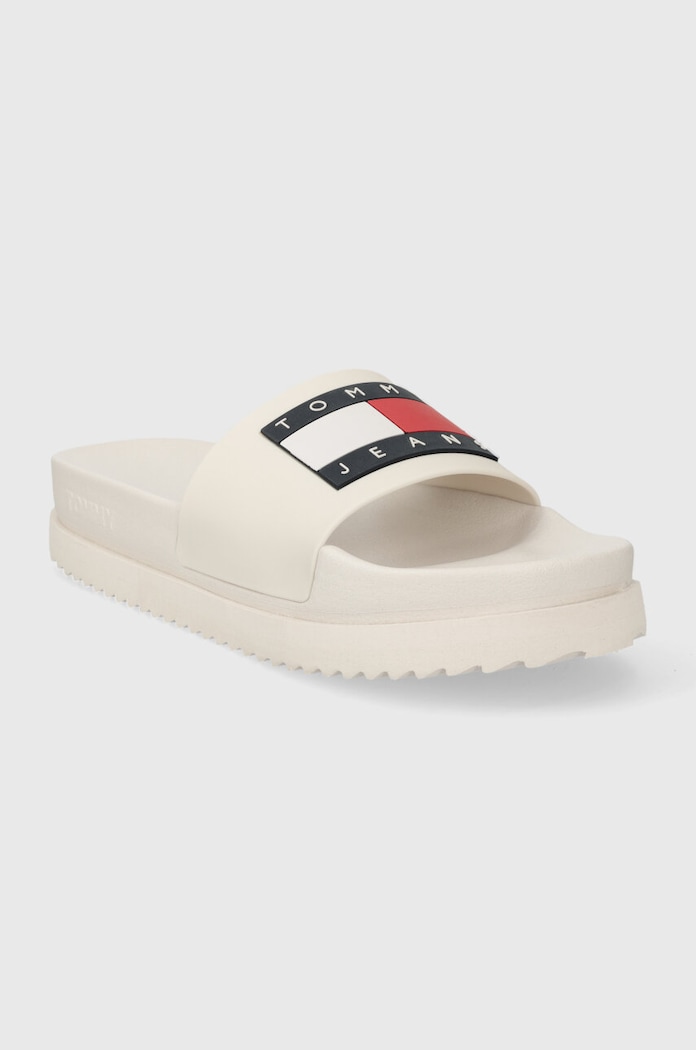 Pantofle Tommy Jeans TJW ELEVATED FLATFORM SLIDE EN0EN02451 béžová SS24
