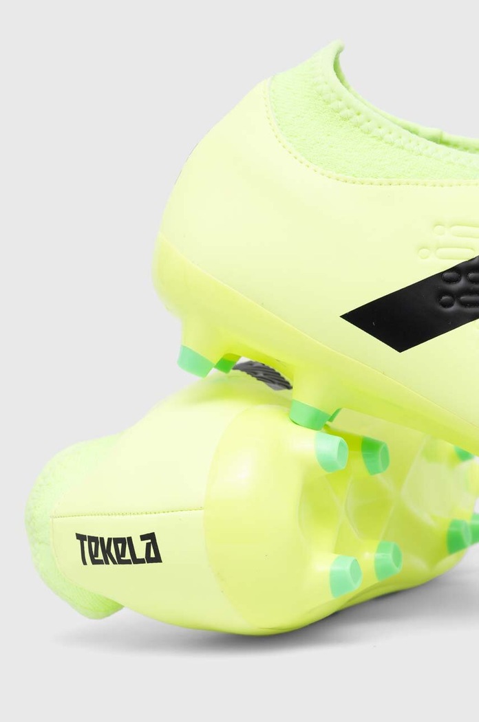 Nogometni čevlji New Balance korki Tekela Magique FG V4+ zelena ST3FL45