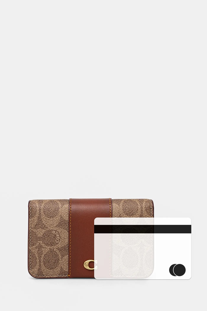 Δερμάτινο πορτοφόλι Coach καφέ CR542