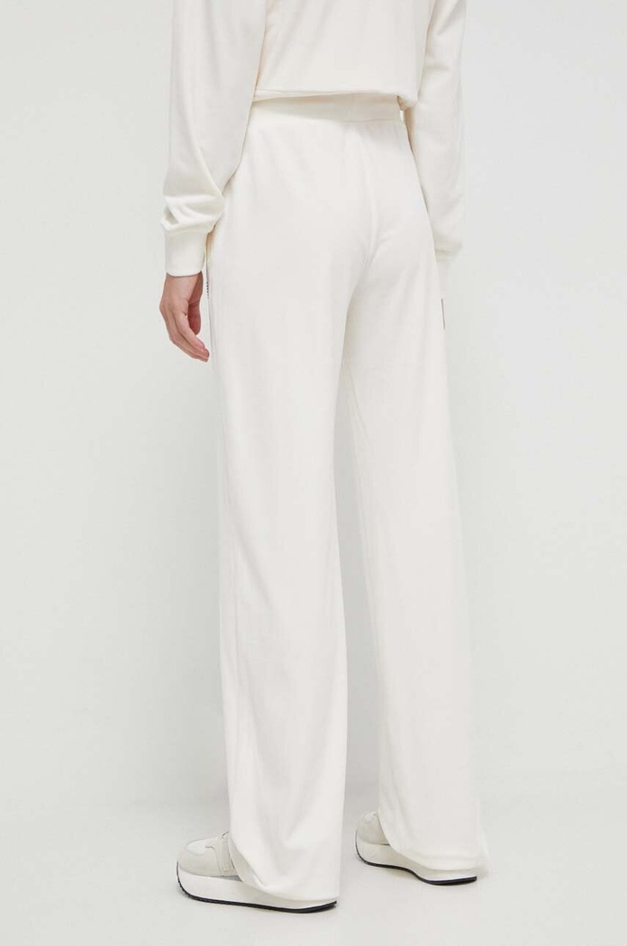 Odzież Guess spodnie dresowe COUTURE V3BB26.KBXI2 beżowy