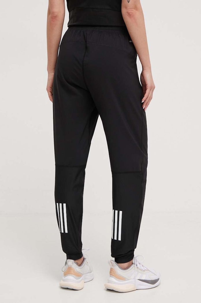 Oblečenie Bežecké nohavice adidas Performance Own the Run IK7444 čierna