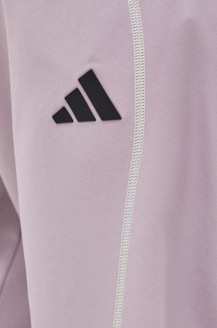 Hlače za vadbo adidas Performance Woven roza IL7365