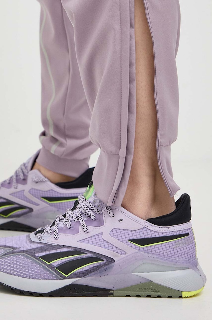 Hlače za vadbo adidas Performance Woven IL7365 roza
