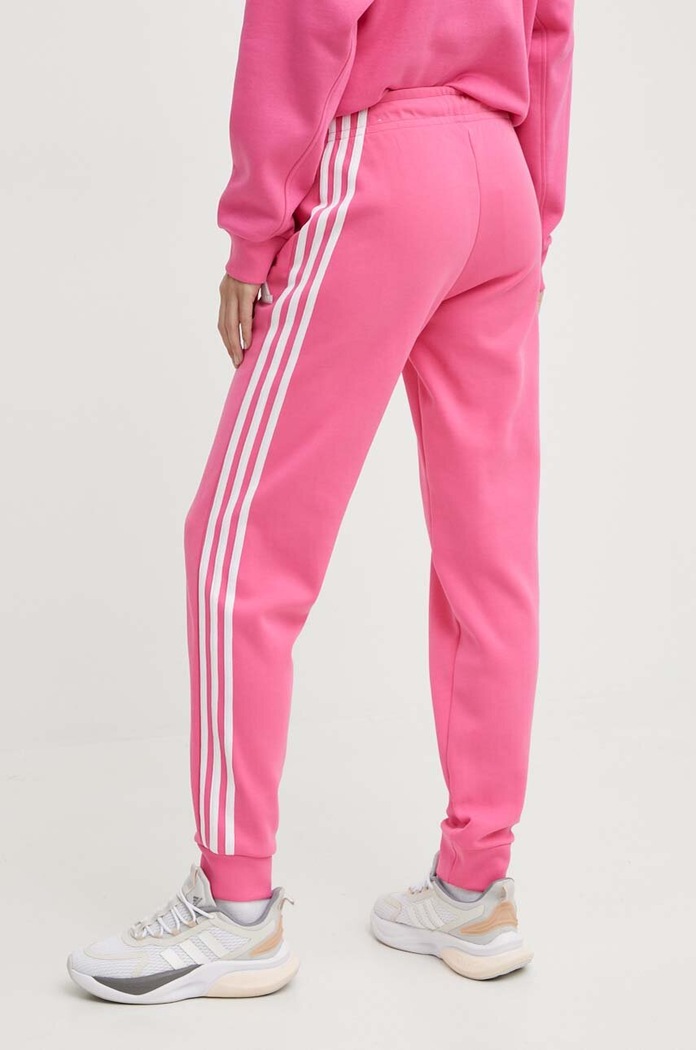 Odzież adidas spodnie dresowe IS3942 różowy