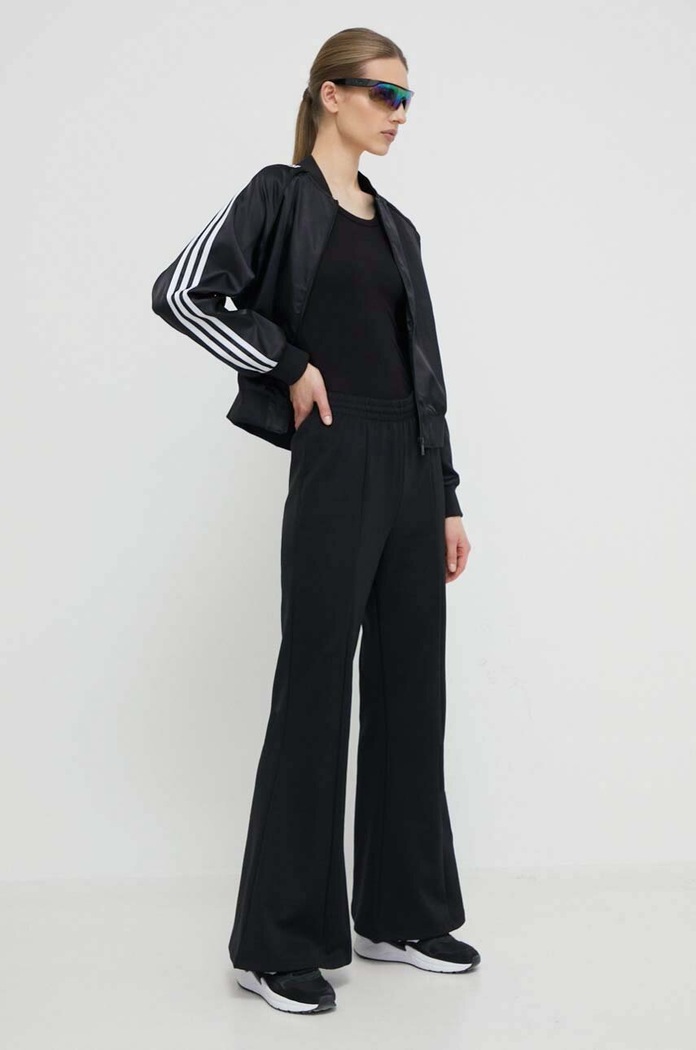 Spodnji del trenirke adidas Originals Flared IT9240 črna SS24