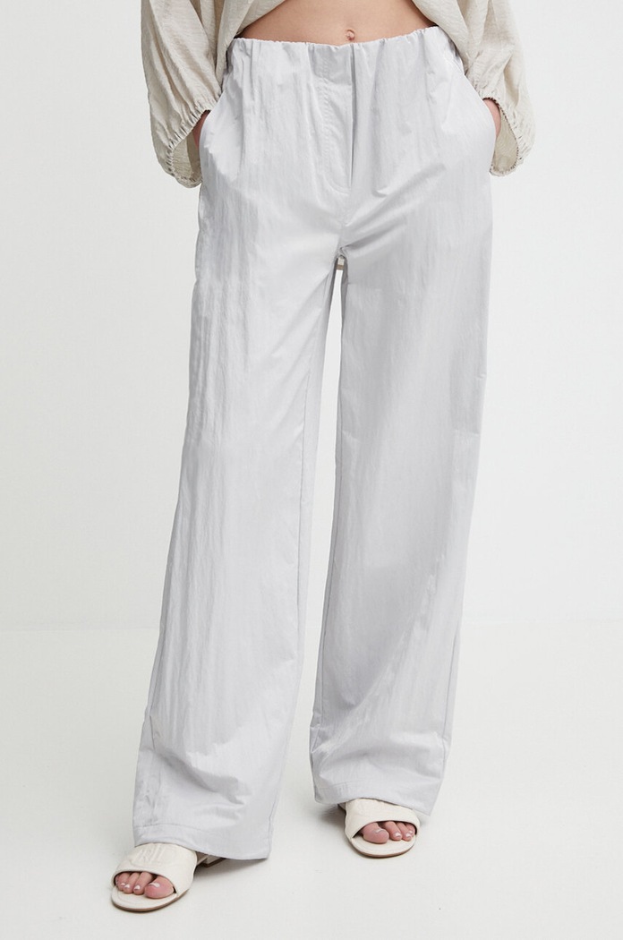 Nohavice Calvin Klein Jeans látka sivá J20J223122