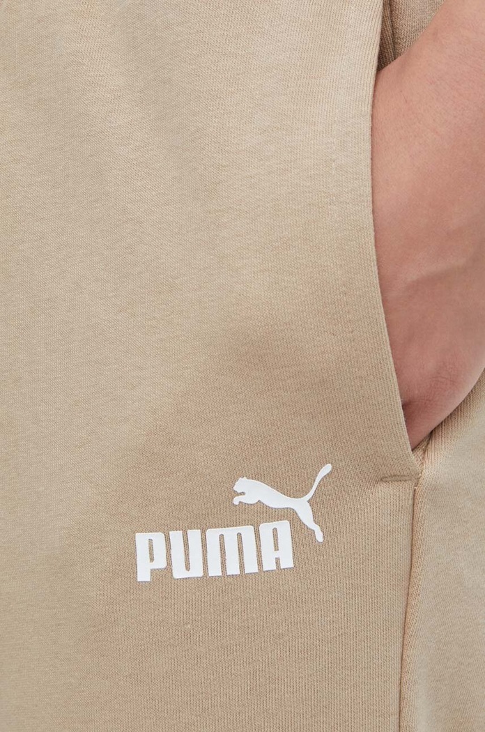 Puma spodnie dresowe beżowy 678744