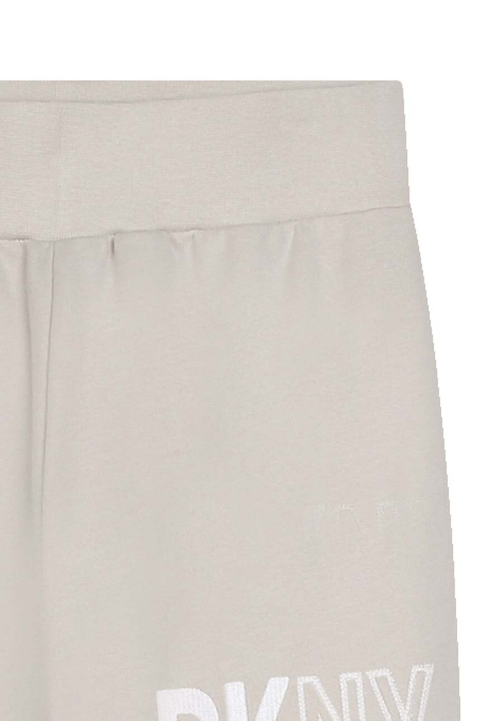 Dkny spodnie dresowe bawełniane dziecięce biały D60033.114.150