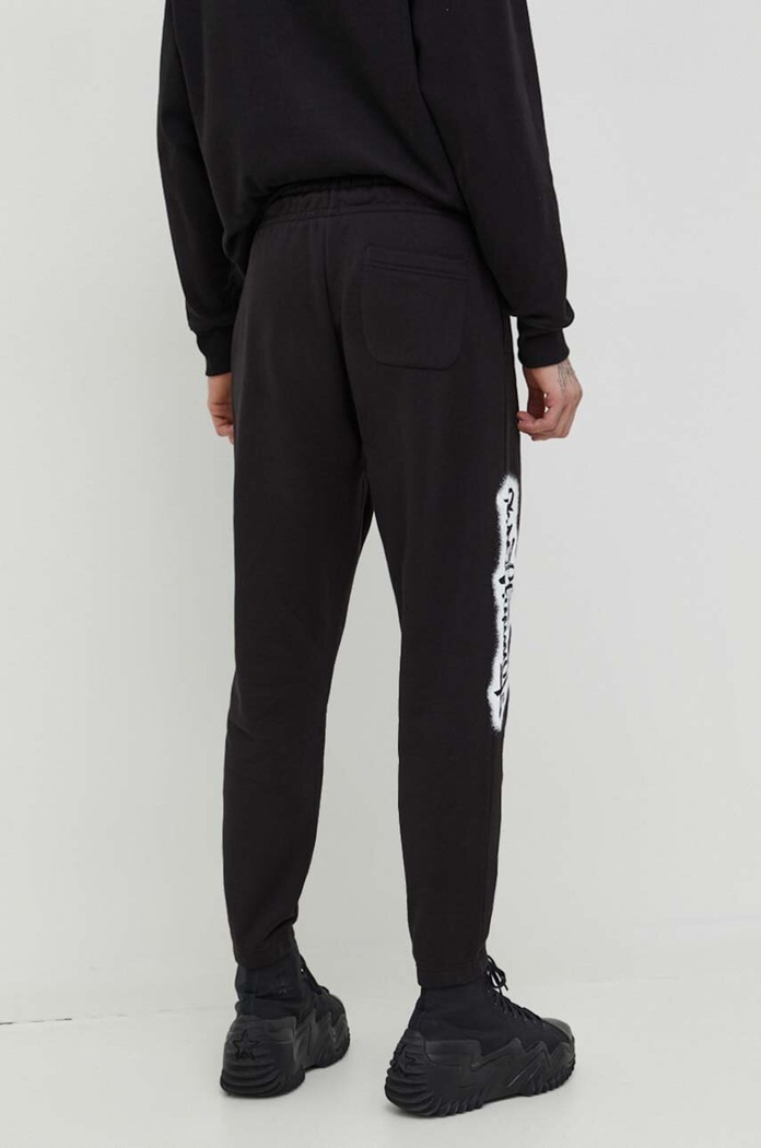 Odzież Tommy Jeans spodnie dresowe DM0DM18376 czarny