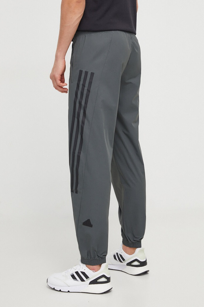 Oblečení Tepláky adidas IR9238 zelená