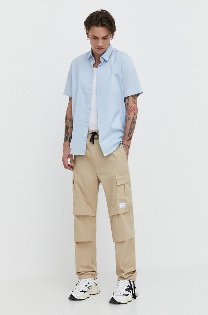Bavlněné kalhoty Hugo Blue látka béžová 50517923