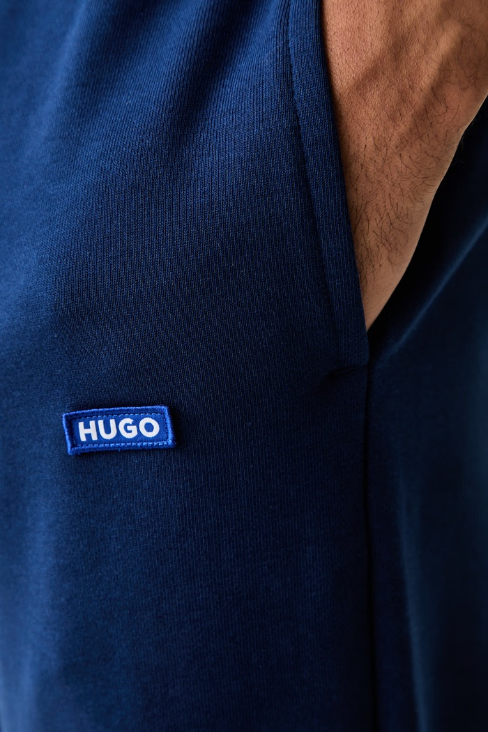 HUGO Blue спортивные штаны для мужчин из хлопка Napin голубой 50522372