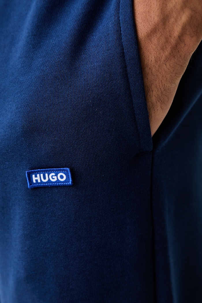 HUGO Blue спортивные штаны для мужчин из хлопка Napin голубой 50522372
