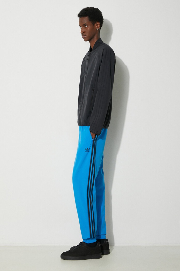 Donji dio trenirke adidas Originals SST Bonded IM9881 plava SS24