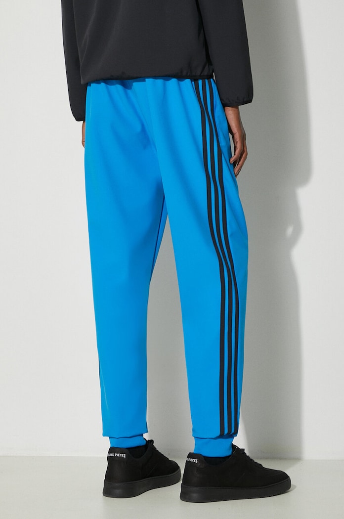 Odjeća Donji dio trenirke adidas Originals SST Bonded IM9881 plava