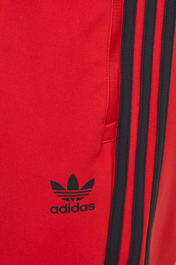 Tepláky adidas Originals červená IS2808
