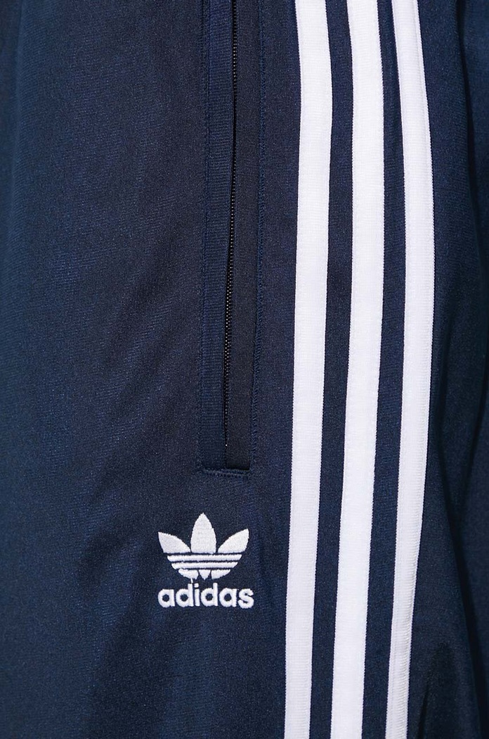 Spodnie dresowe Adicolor Classics Firebird adidas Originals granatowy IM9471