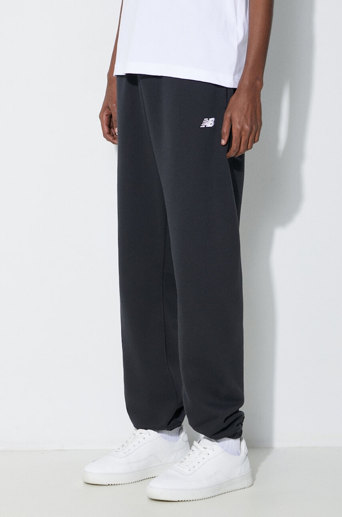 Παντελόνι φόρμας New Balance Essentials French Terry Jogger πλεκτό ύφασμα μαύρο MP41519BK