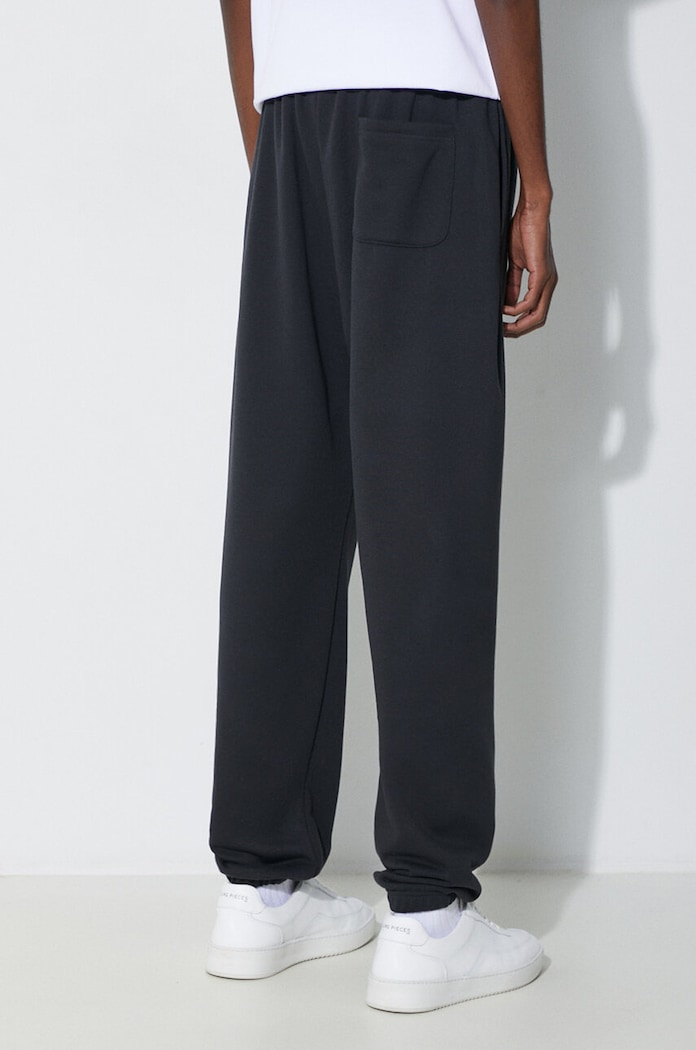 Ρούχα Παντελόνι φόρμας New Balance Essentials French Terry Jogger MP41519BK μαύρο