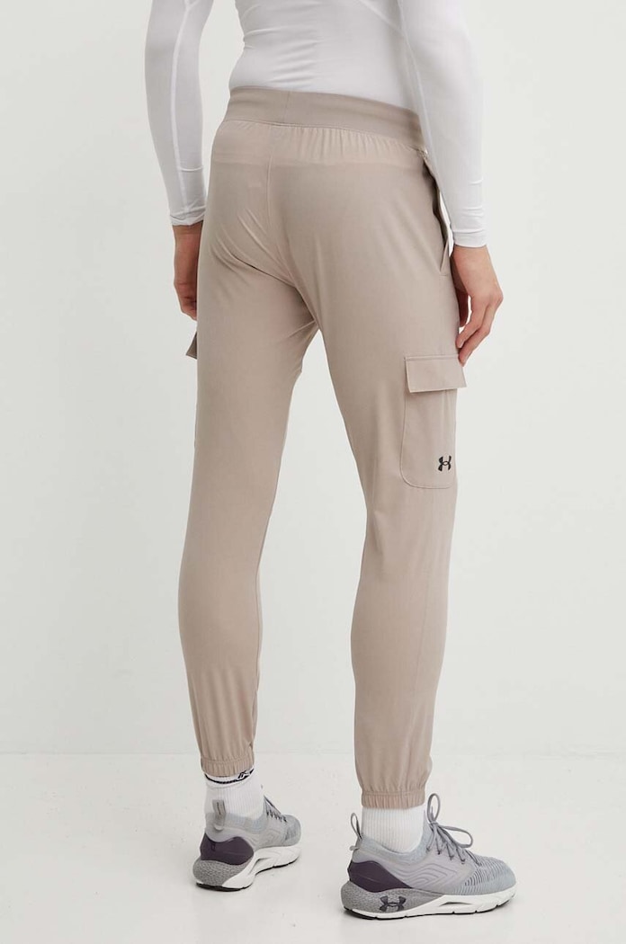 Odzież Under Armour spodnie treningowe 1380358 beżowy