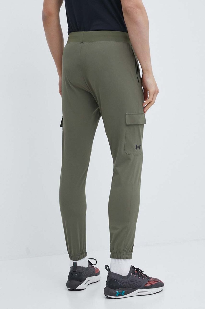 Odzież Under Armour spodnie treningowe 1380358 zielony