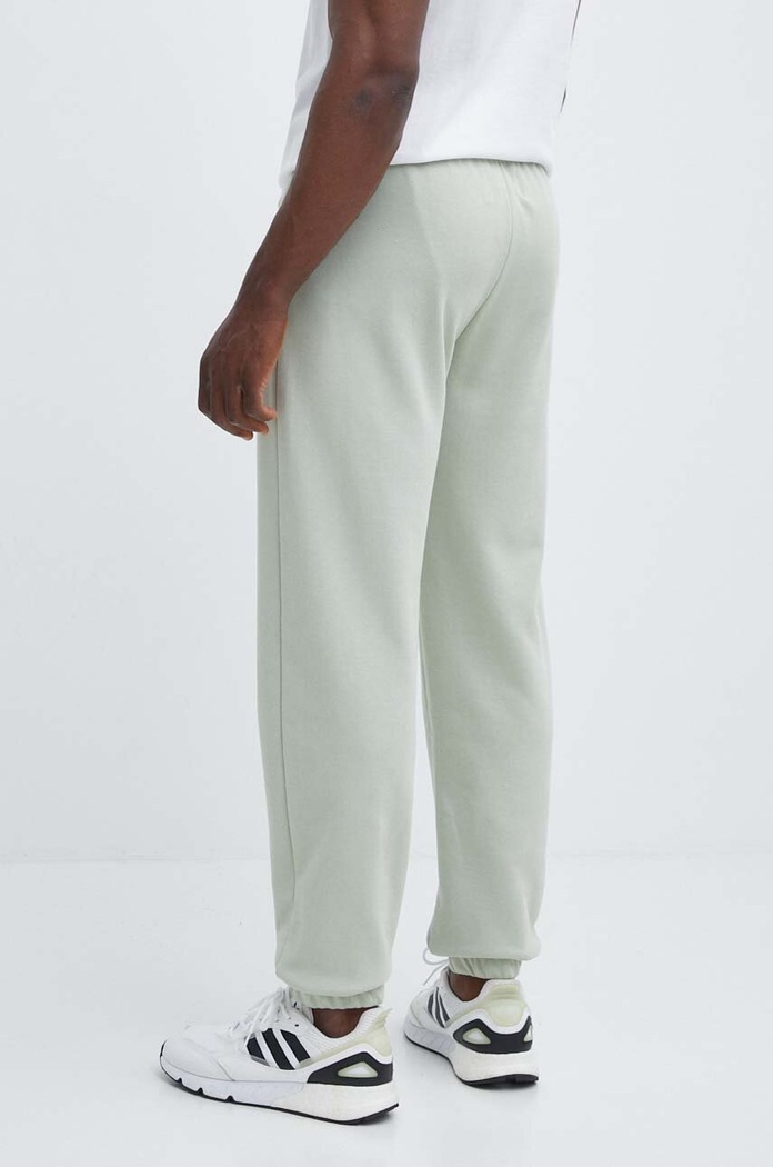 Îmbrăcăminte Champion Pantaloni de trening E20001 verde
