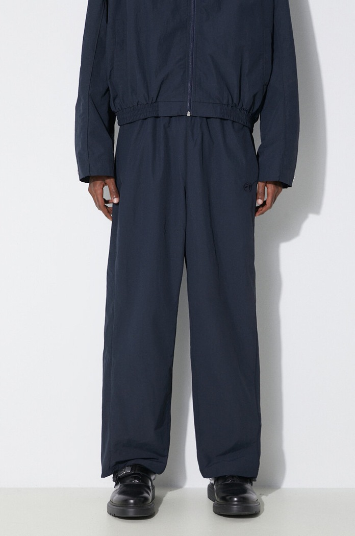 Hlače AMBUSH Nylon Track Pants mornarsko plava BMCJ002S24FAB0014646