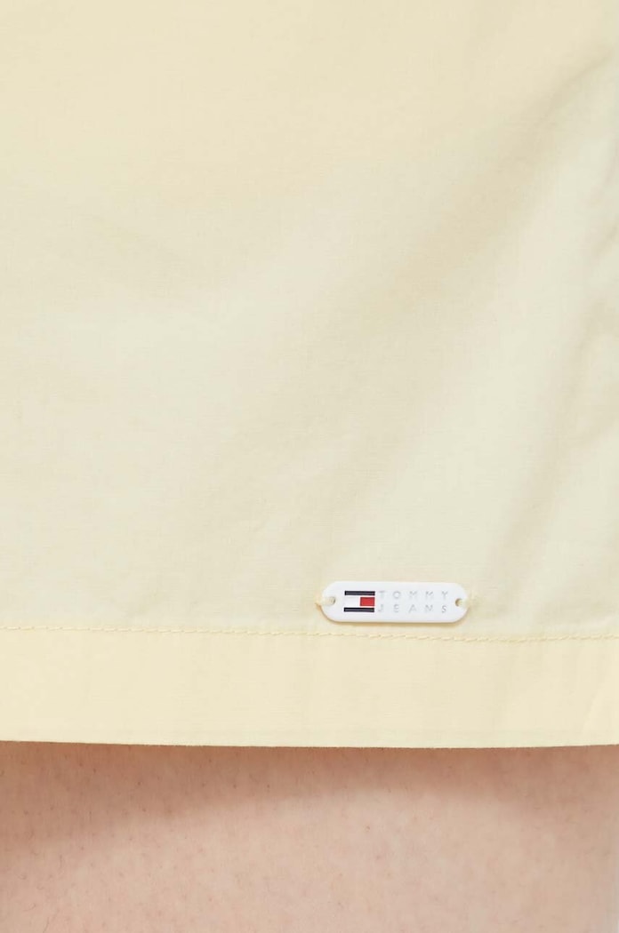 Bavlněné šortky Tommy Jeans žlutá DW0DW17778
