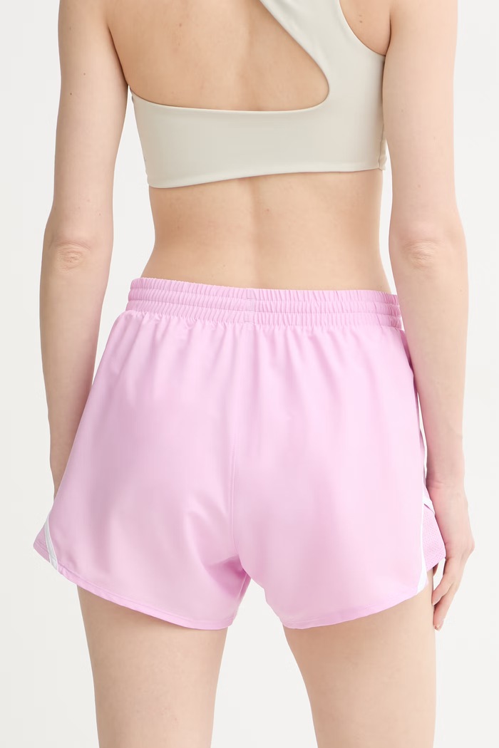 Odzież Under Armour szorty sportowe damskie Fly By 1382438 różowy