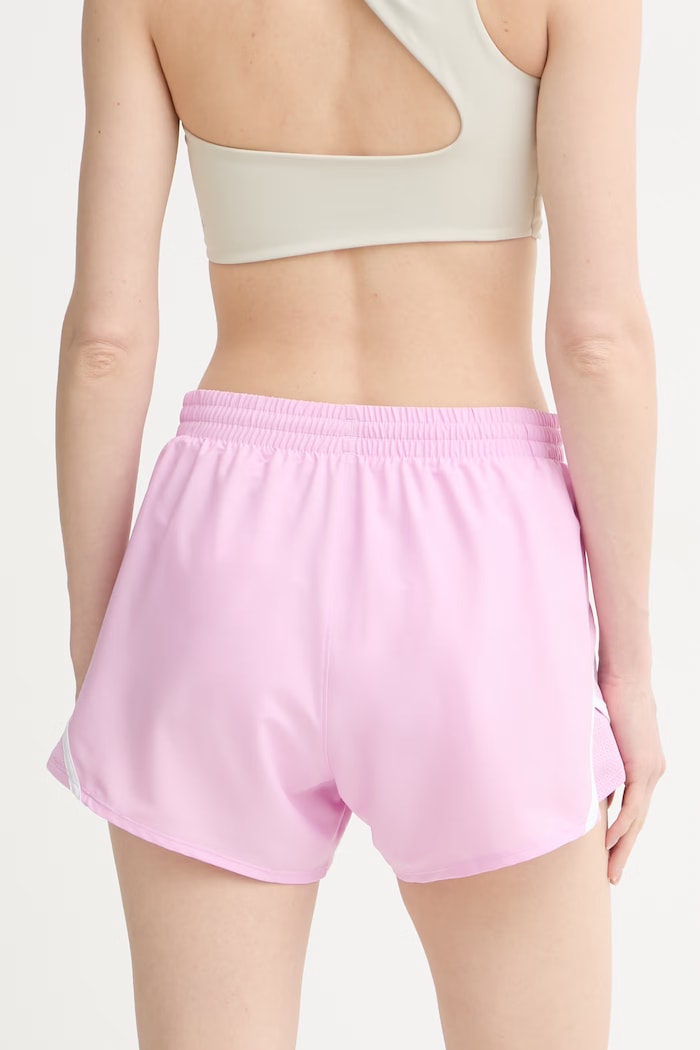 Odzież Under Armour szorty sportowe damskie Fly By 1382438 różowy