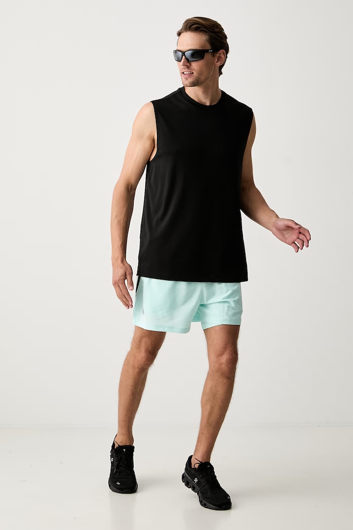 Under Armour sportovní šortky pánské LAUNCH 1382640 tyrkysová SS26