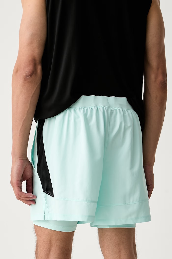 Oblečení Under Armour sportovní šortky pánské LAUNCH 1382640 tyrkysová