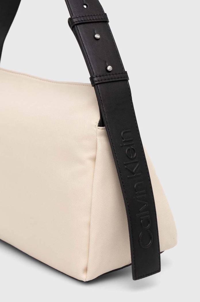 Doplňky Kabelka Calvin Klein K60K611455 béžová
