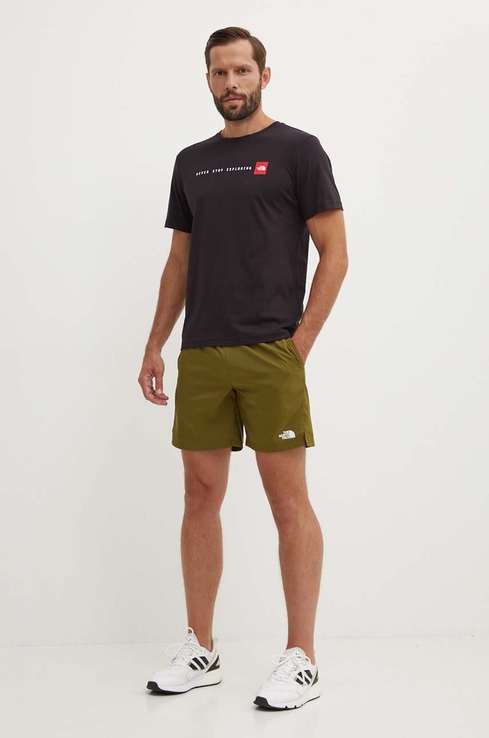 Памучна тениска The North Face M S/S Never Stop Exploring Tee NF0A87NSJK31 черен SS24