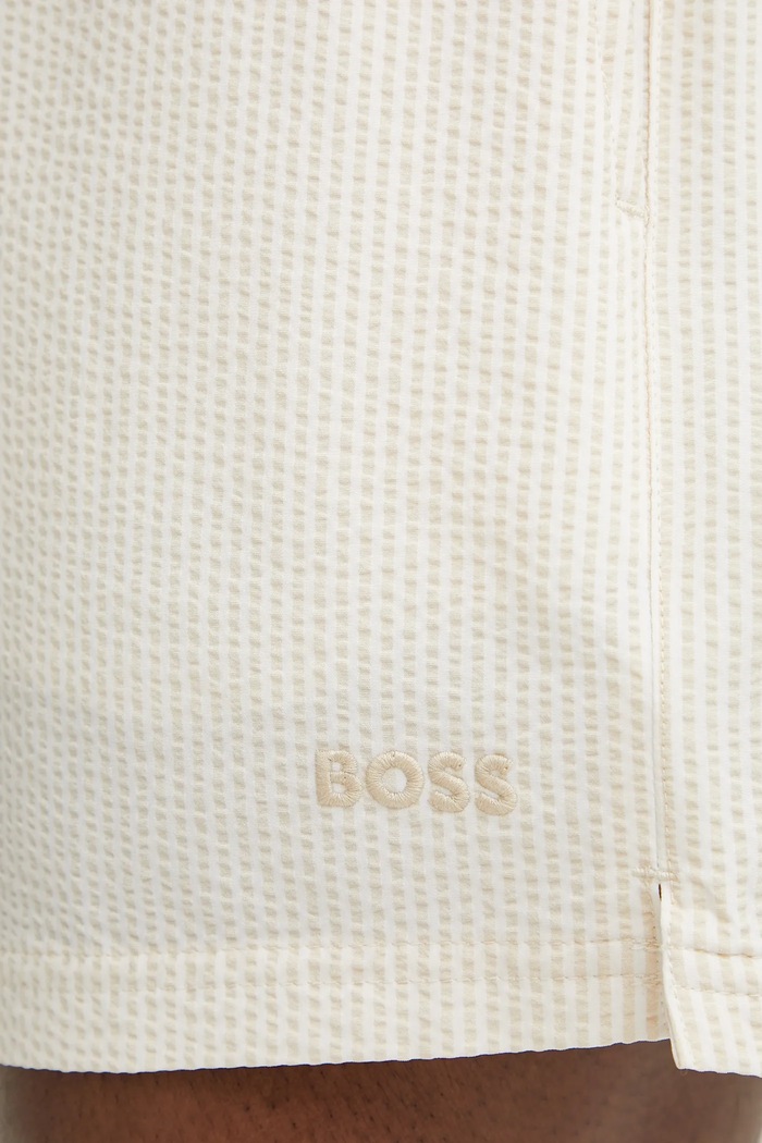 Plavkové šortky BOSS béžová 50540042