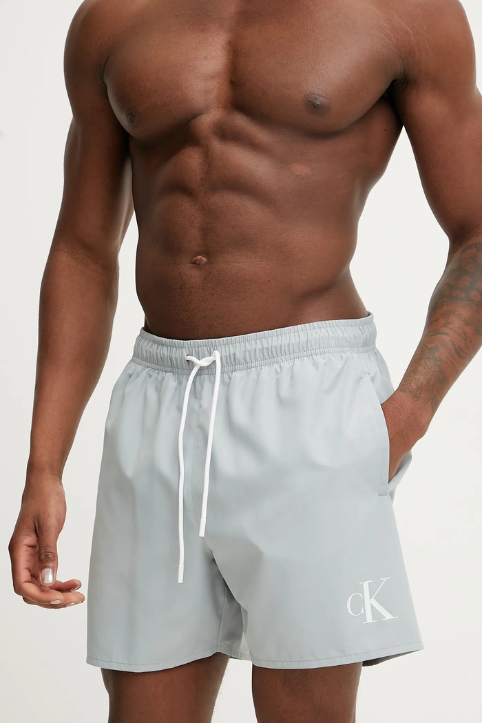 Plavkové šortky Calvin Klein Planet friendly modrá KM0KM01101