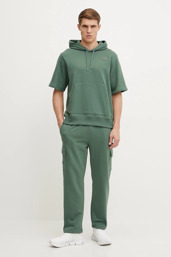 Bombažen pulover The North Face Relaxed NF0A8BW1HCH1 zelena SS25