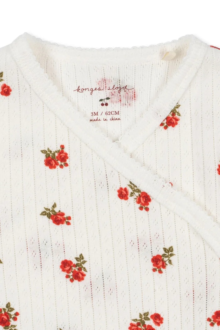 Dziewczynka Konges Sløjd śpioszki niemowlęce MINNIE NEWBORN ONESIE GOTS KS102588 beżowy