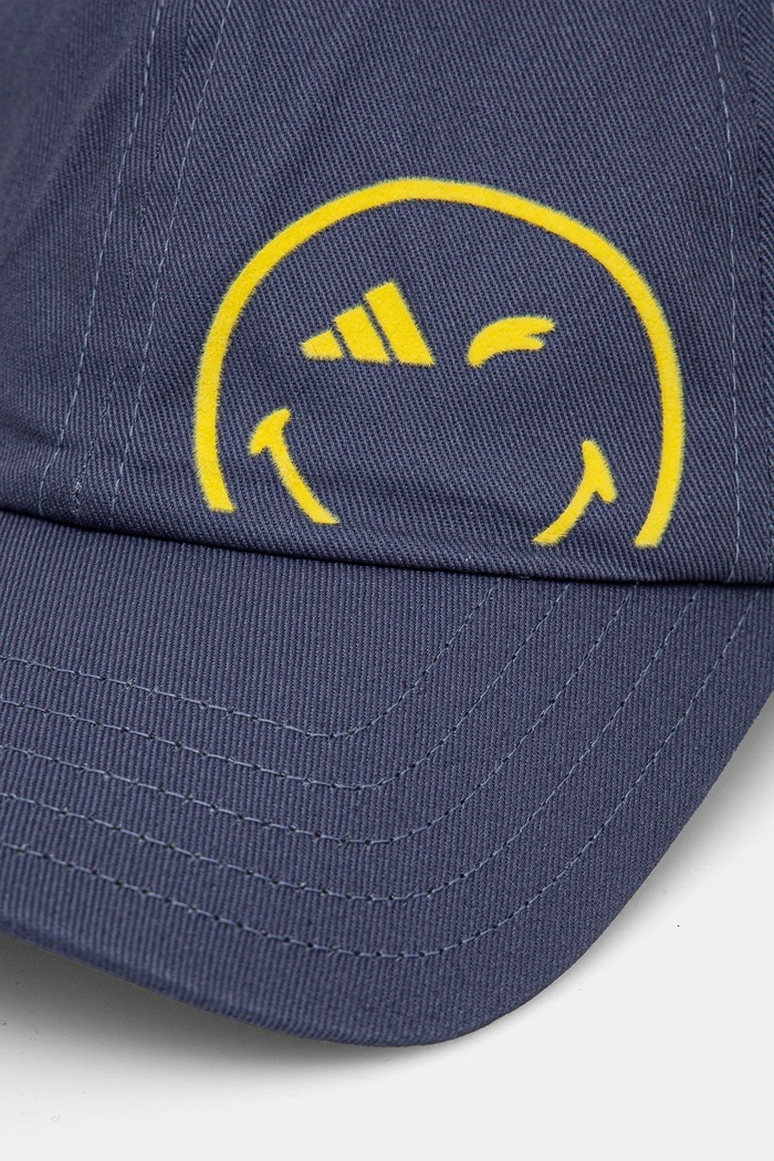 Detská bavlnená šiltovka adidas Performance SMILEY JG5803 tmavomodrá SS25