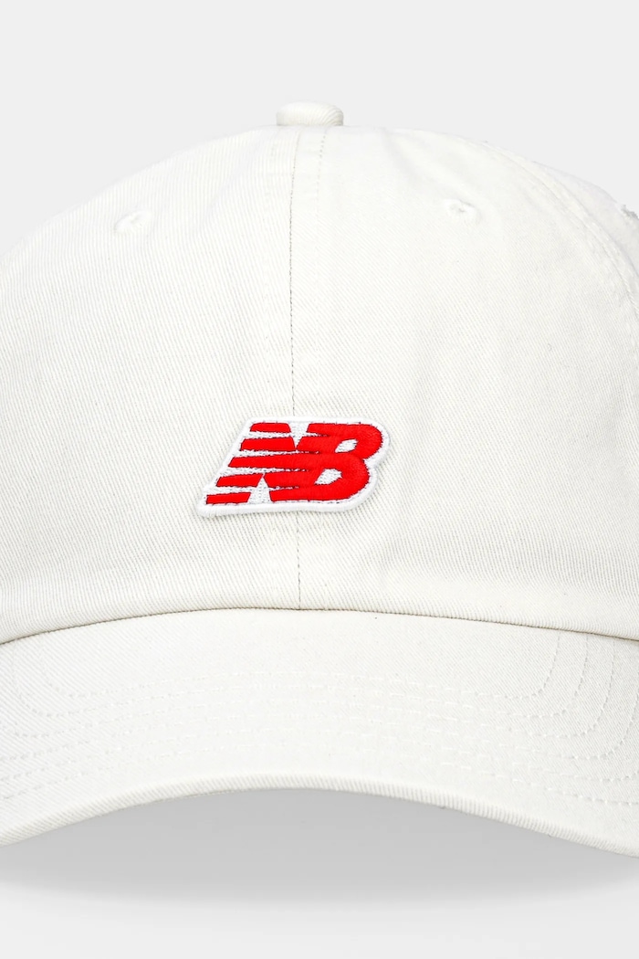 New Balance czapka z daszkiem bawełniana LAH51013SST biały SS25