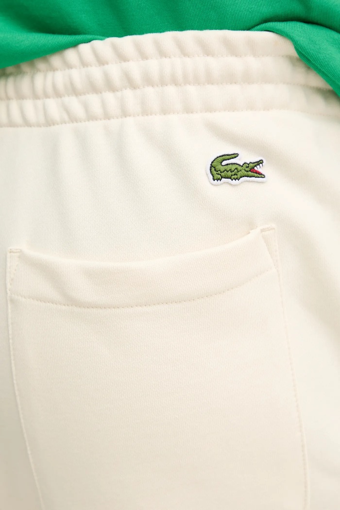 Spodnji del trenirke Lacoste bež XH9777