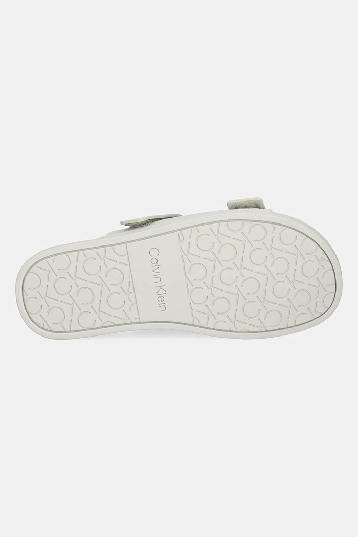 Kožené šľapky Calvin Klein FLAT ADJ SLIDE EYELET HW0HW02489 béžová