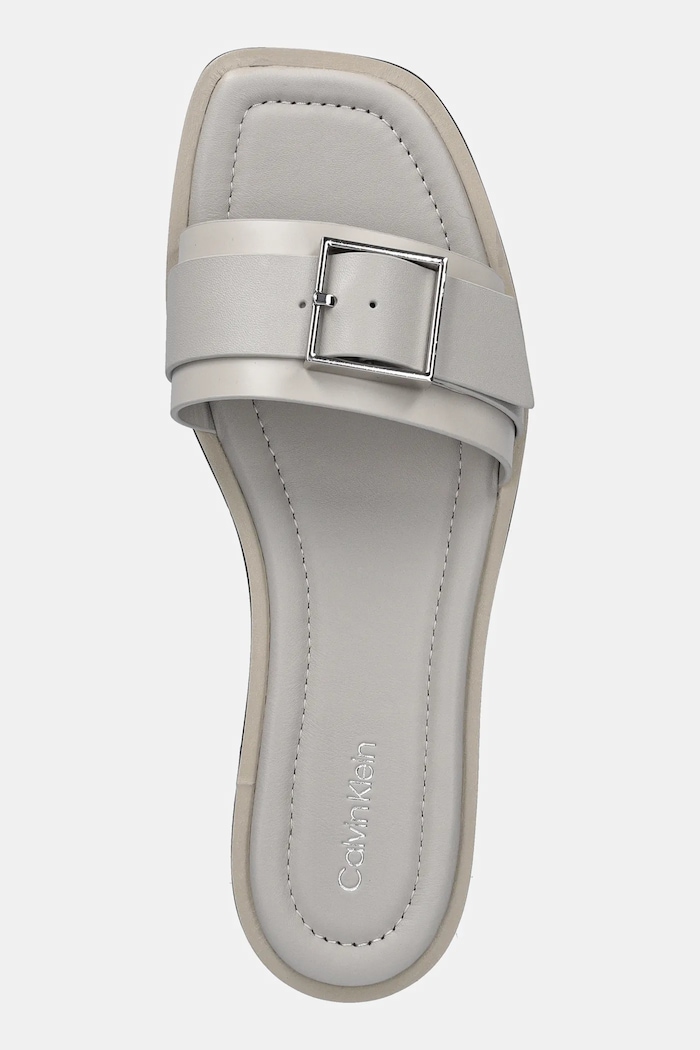 Kožne natikače Calvin Klein FLAT SLIDE W/BUCKLE - LTH bež HW0HW02490