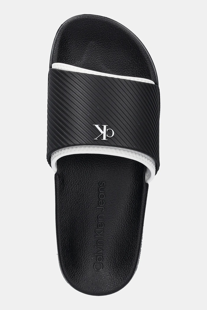 Obutev Natikači Calvin Klein Jeans SLIDE RUBBER NEOPRENE TEXT YM0YM01234 črna