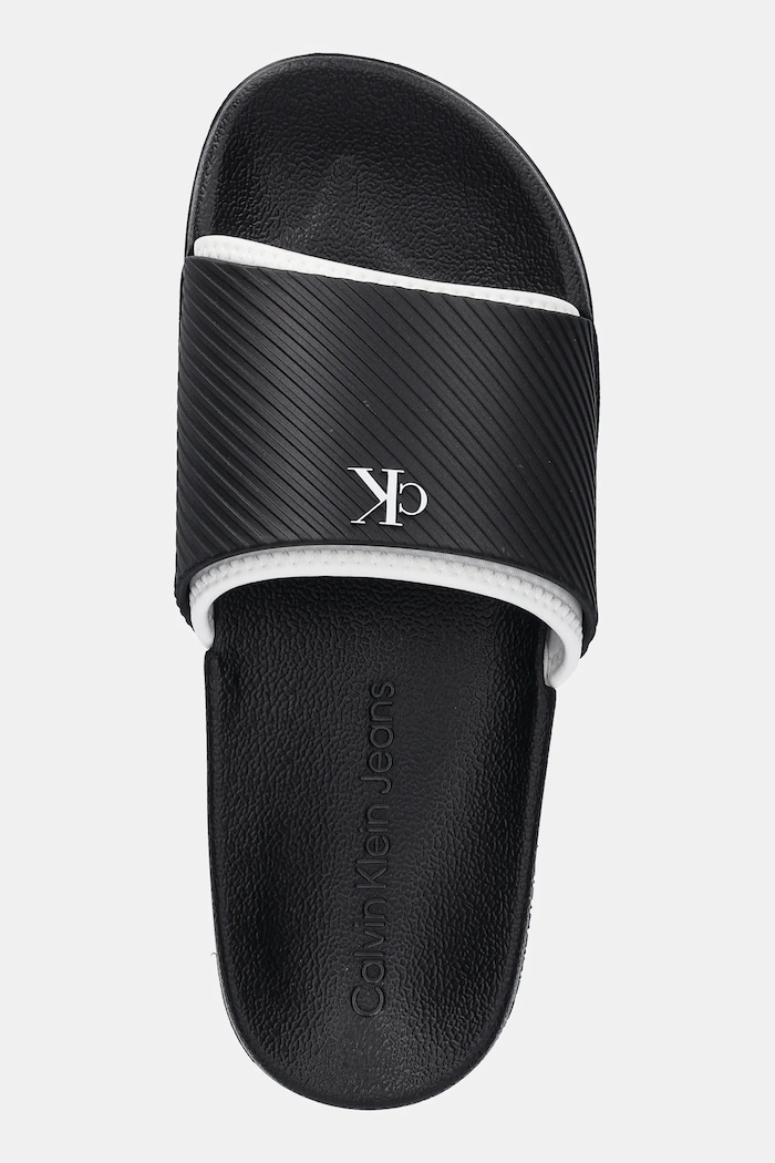 Obutev Natikači Calvin Klein Jeans SLIDE RUBBER NEOPRENE TEXT YM0YM01234 črna