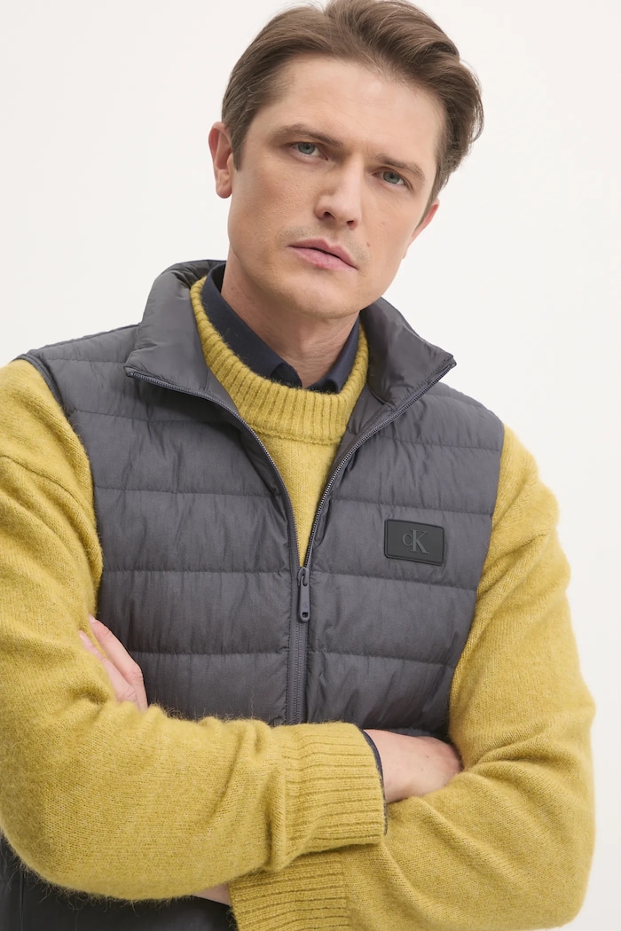 Péřová vesta Calvin Klein Jeans šedá J30J326718