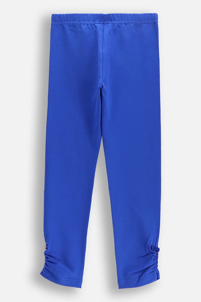 Coccodrillo legginsy bawełniane dziecięce WC5122101FGK niebieski SS25