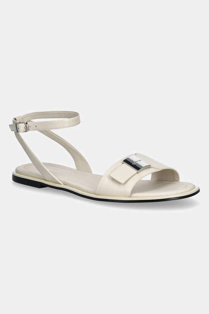 Calvin Klein sandały skórzane FLAT SANDAL W/CK HW - LTH płaski beżowy HW0HW02367